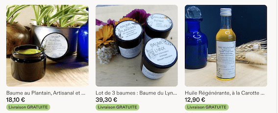 Trois produits de la boutique Etsy Luma Kalodaya : un baume au plantain en pot noir, un lot de trois baumes et une huile régénérante à la carotte en flacon bleu